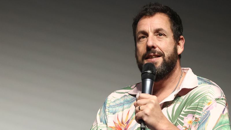 Adam Sandler nonetheless will get emotional singing Chris Farley track