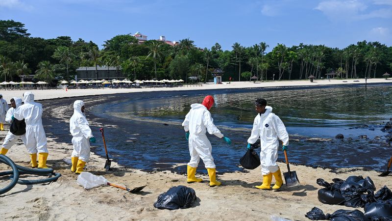 Singapore races to wash oil spill as luxurious seashore resort coated in slick